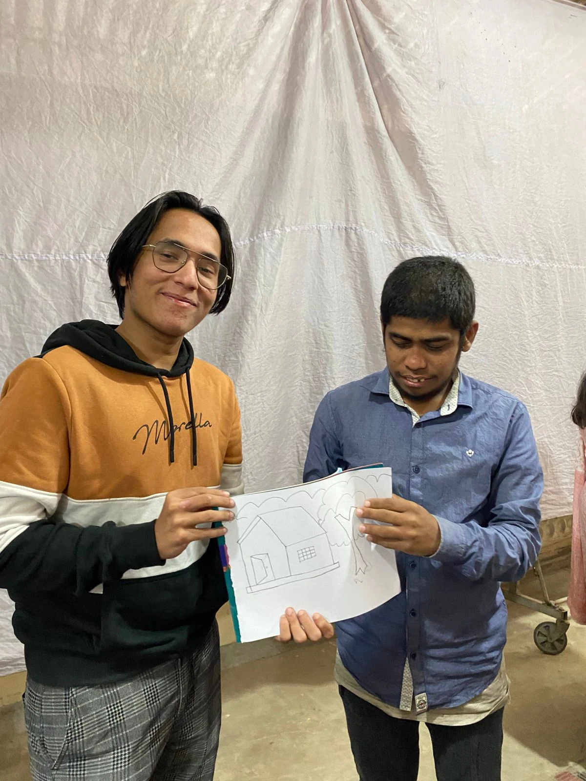 Inclusive Art Celebration - Volunteer Assisting Drawing