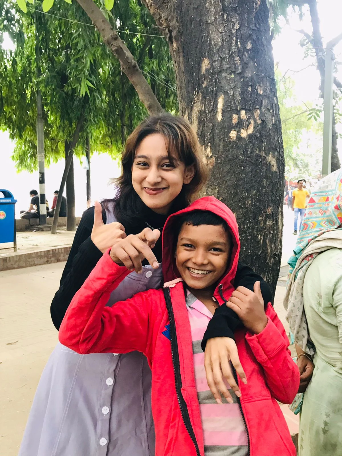 Winter Clothes Distribution - Volunteer with Child