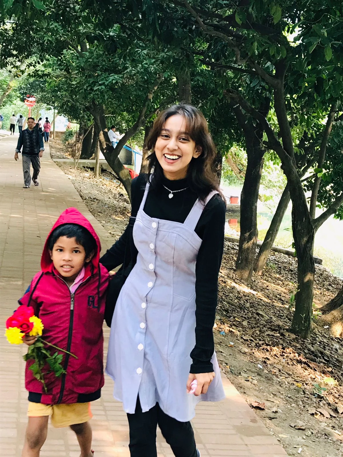 Winter Clothes Distribution - Volunteer with Child